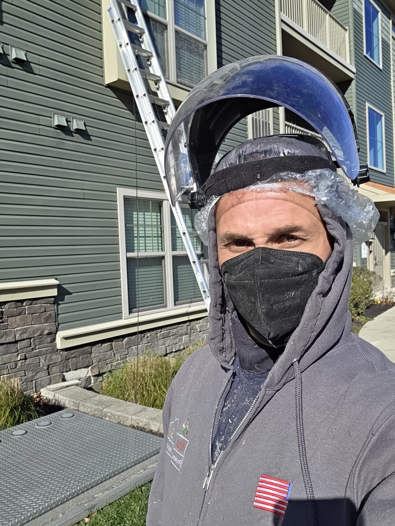 Your Duct Guy technician in full safety gear at a condominium job