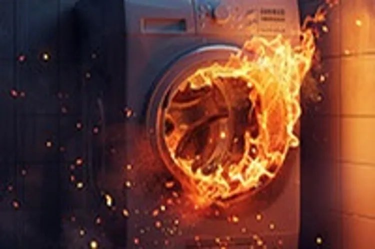 Dryer with flames shooting from the door