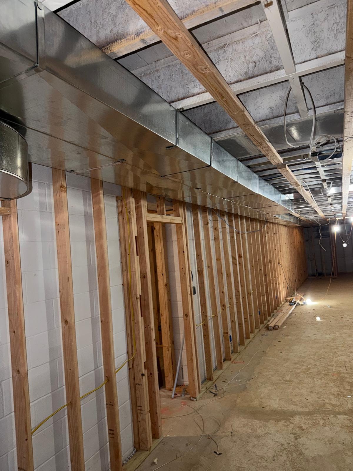 New sheet-metal duct trunk in new construction