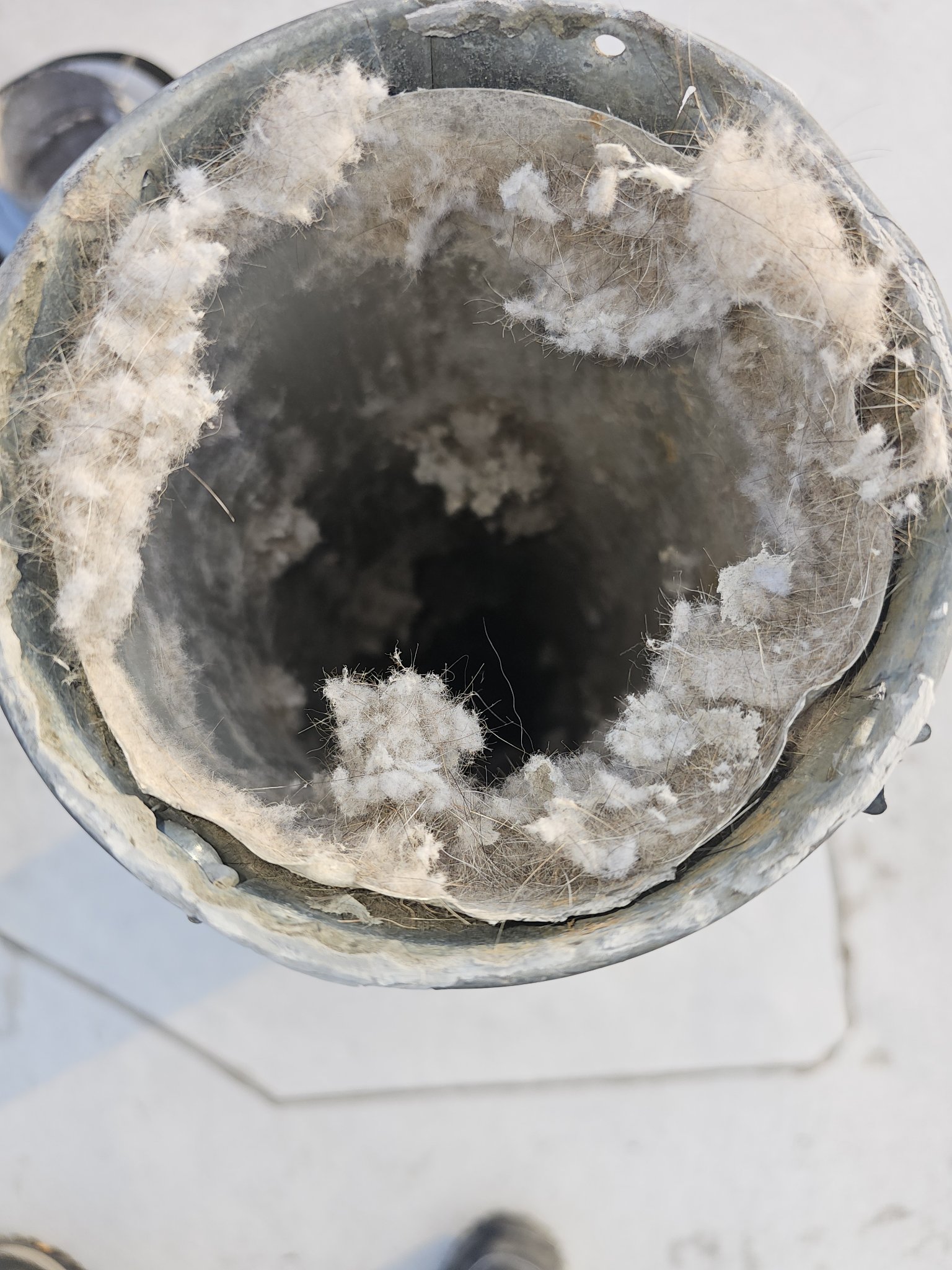 Hotel Dryer Vent Rim Packed With Lint