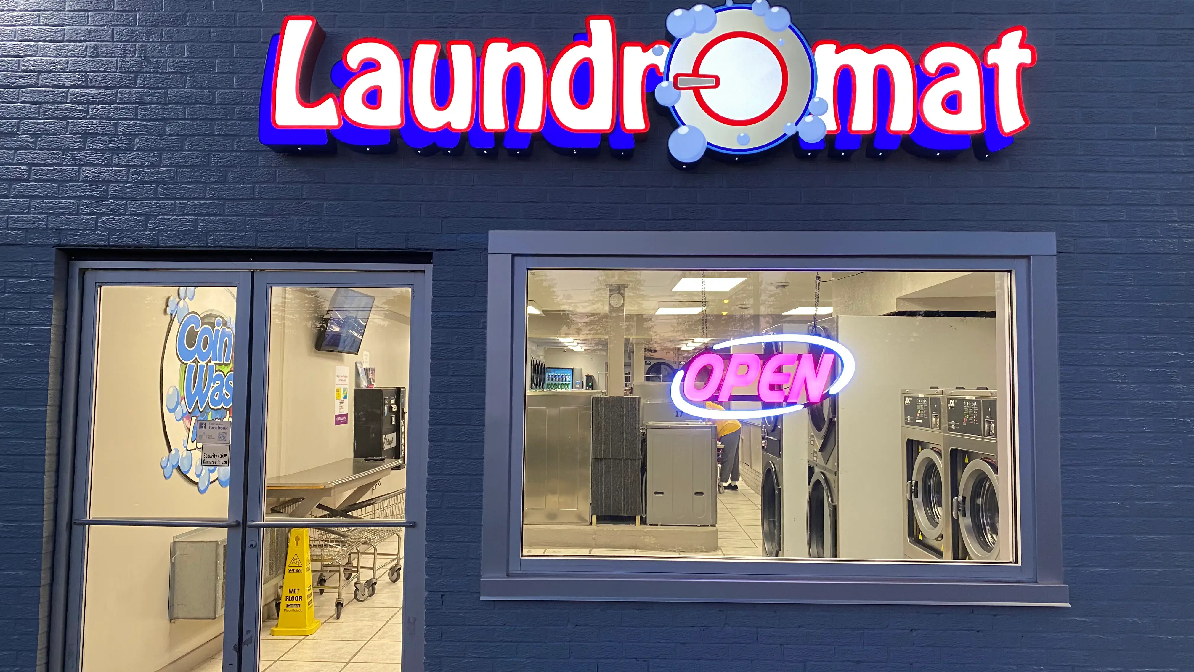 Laundromat Storefront With Coin Wash And Open Sign