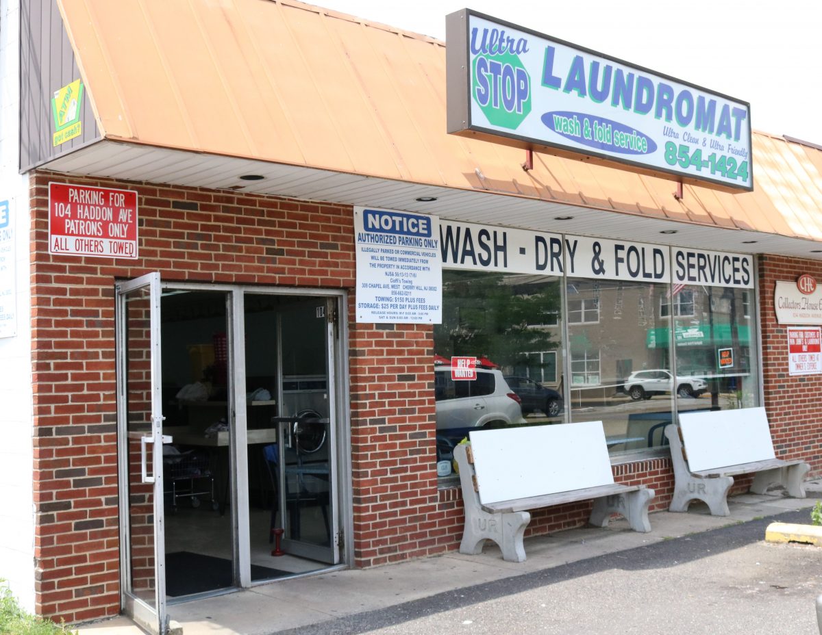 Laundromat Storefront With Wash And Fold Service
