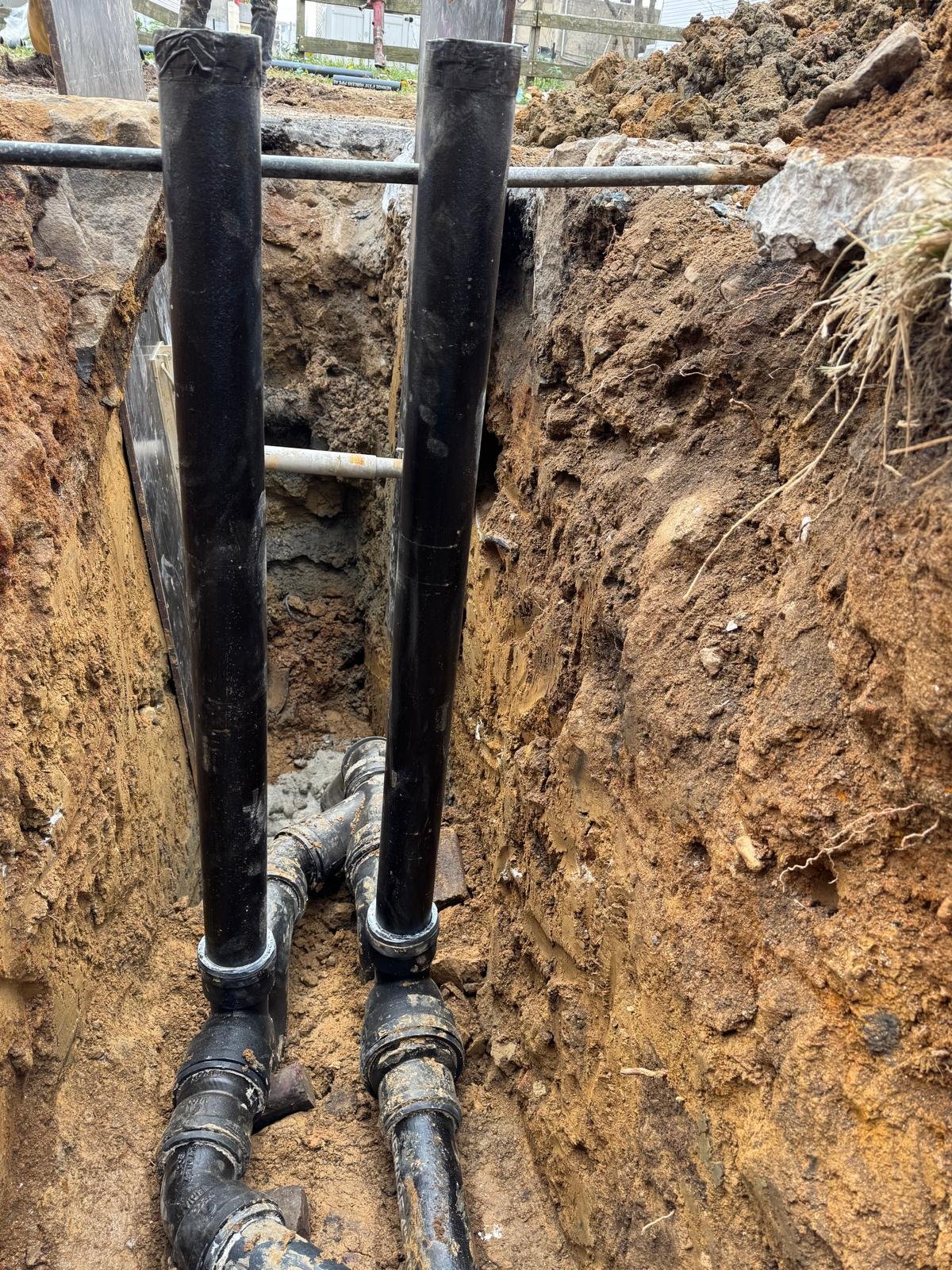 PEX manifold with red and blue lines in new construction
