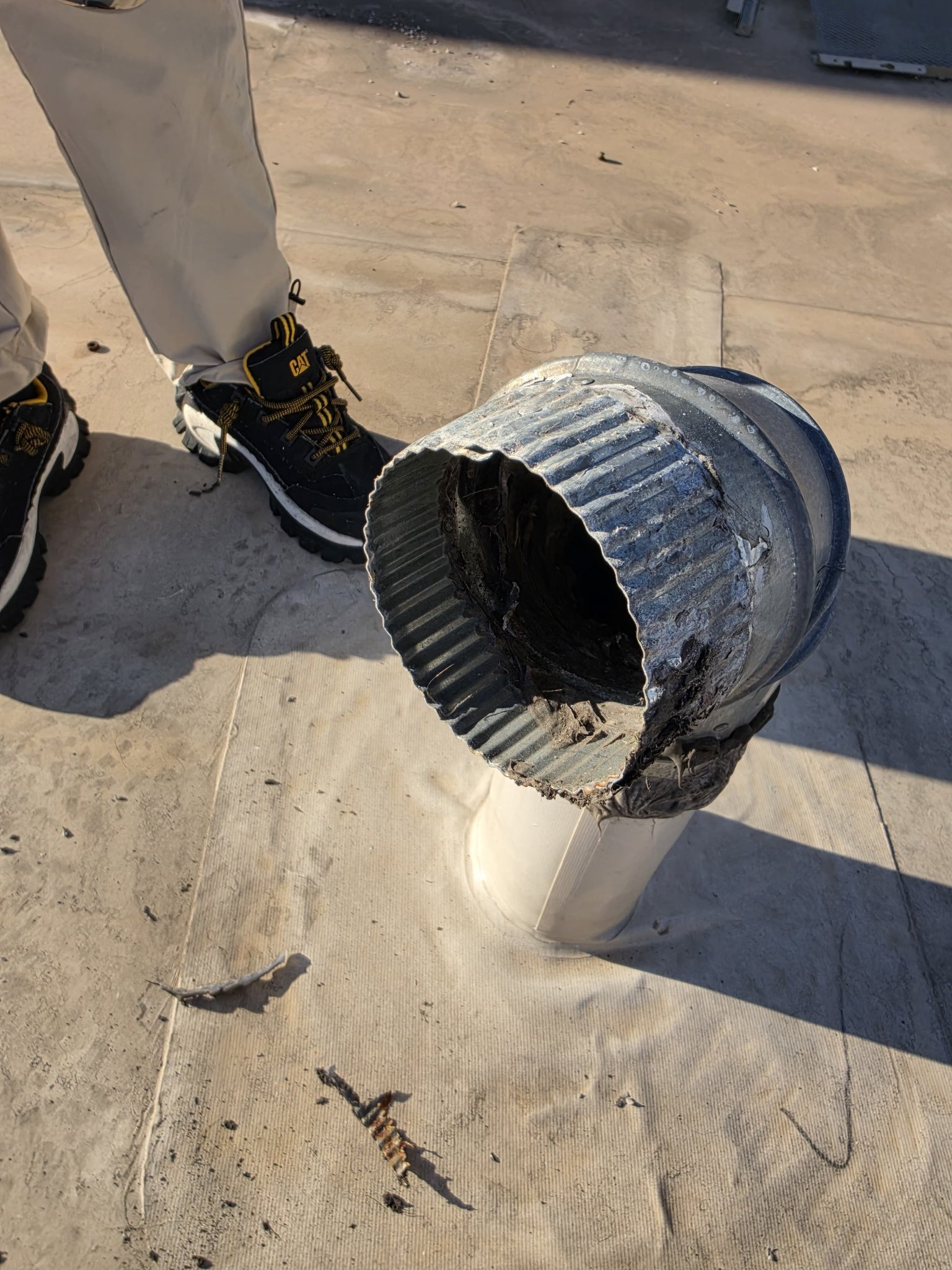 Rooftop Dryer Exhaust Vent At A Salon Before Cleaning